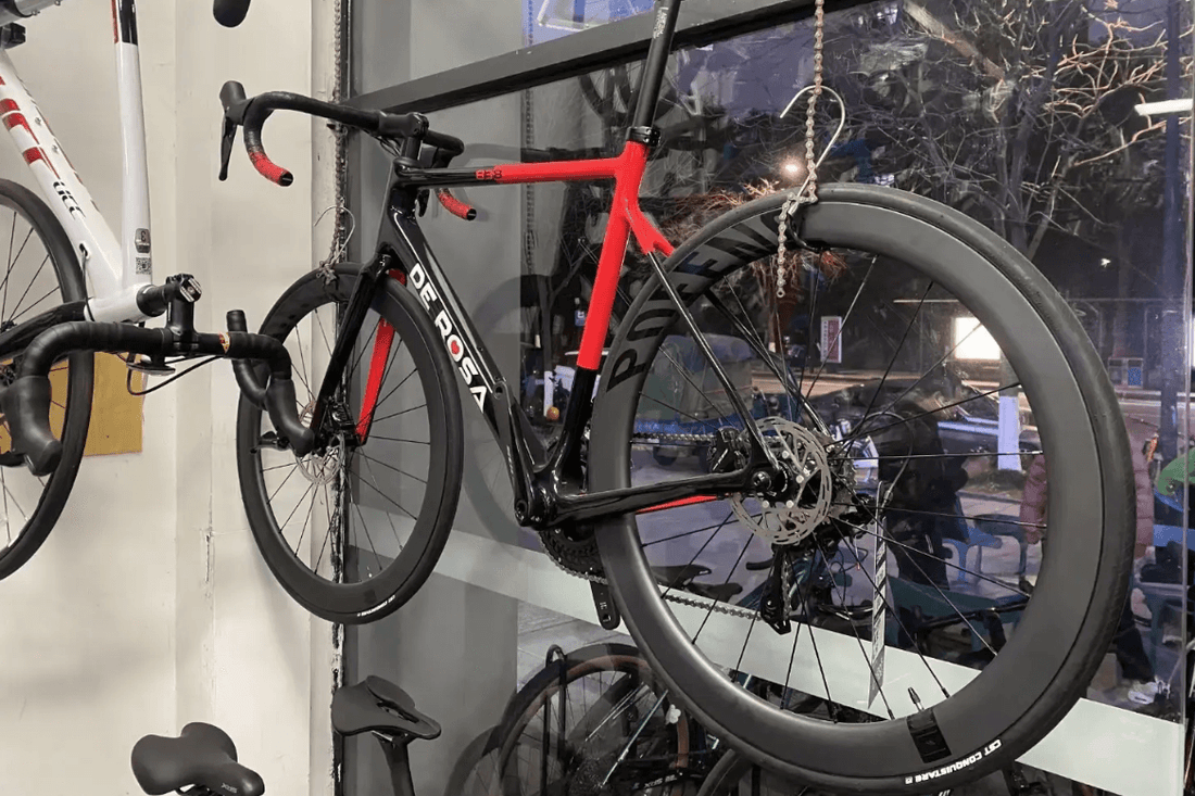 On the influence of aerodynamic posture on cycling speed